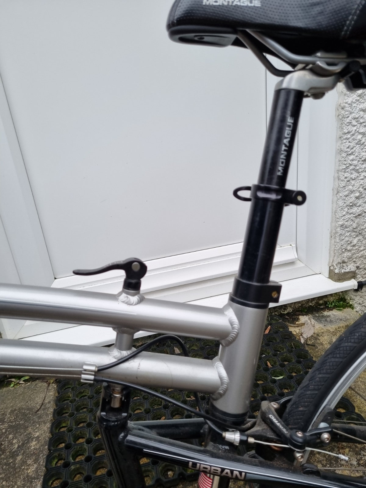 Montague Urban folding bicycle with full size wheels. Silver excellent condition