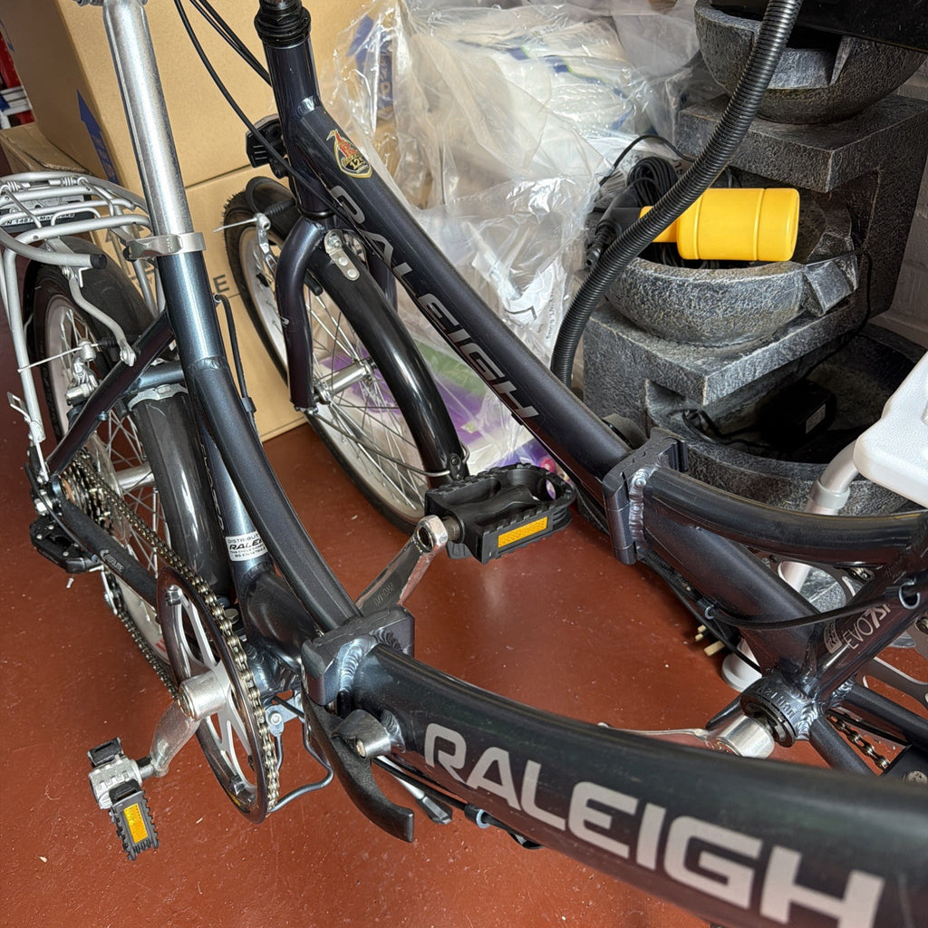 A Pair Of Raleigh Evo 7sp Airlight Folding Bike Aluminum, 20" Wheels