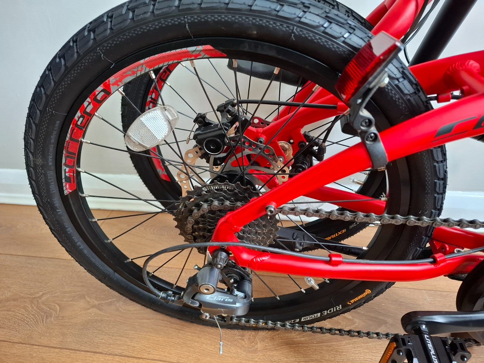 Carrera Intercity Disc 8-Speed Folding Bike With Accessories and more