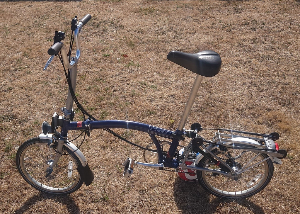 Brompton M6R folding bike good condition front rear rack bag led lights 6 speed