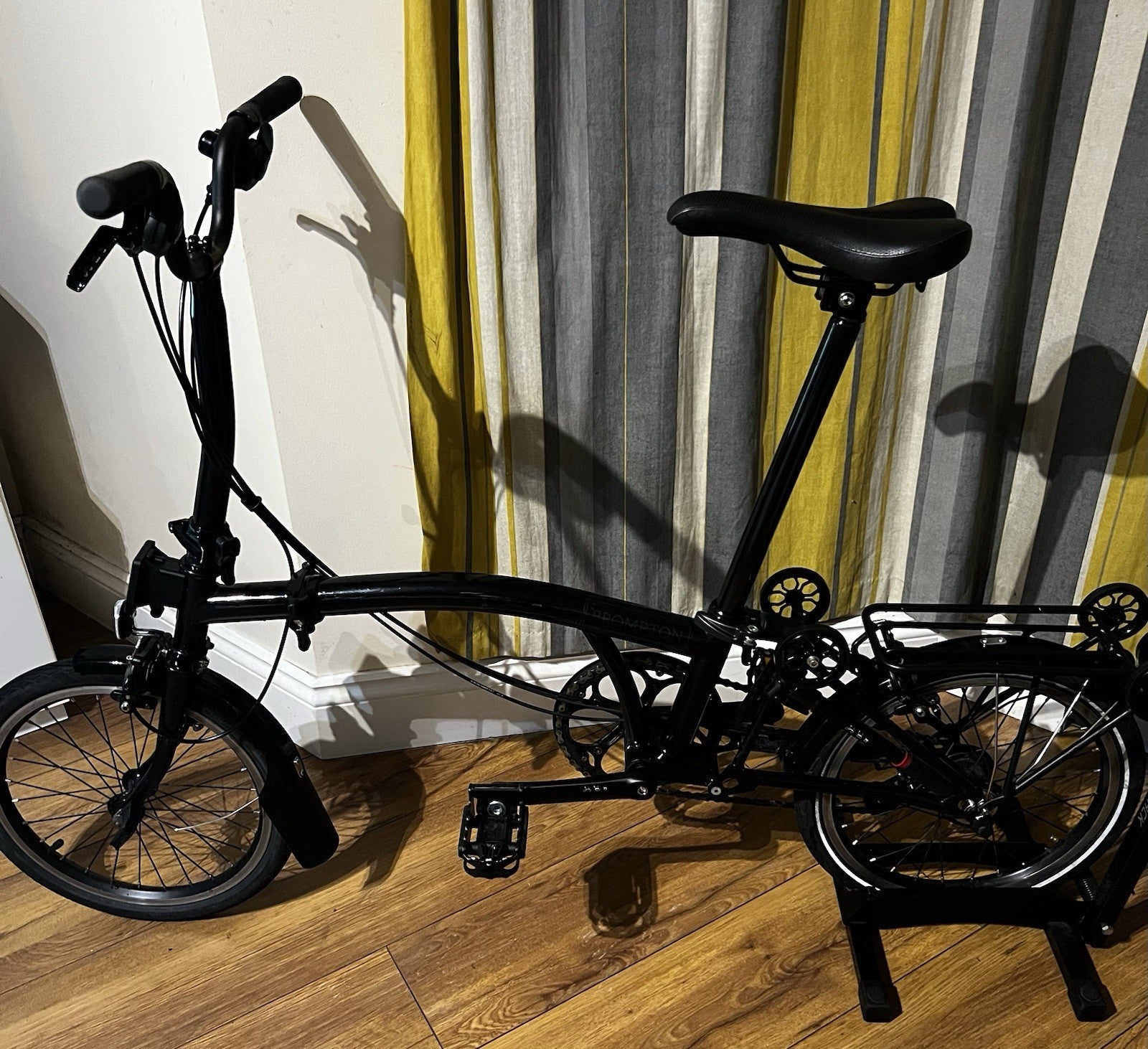 Brompton 6-Speed Black edition with panier rack and roller wheels