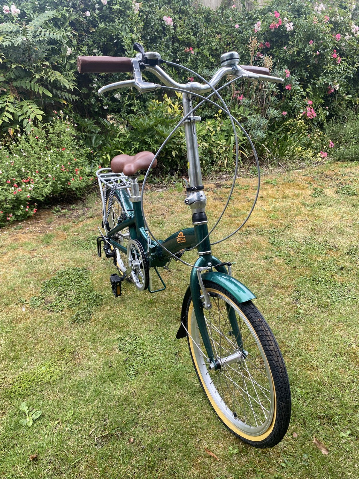Green and Brown Kringla folding bike. Great Condition. Barely used.