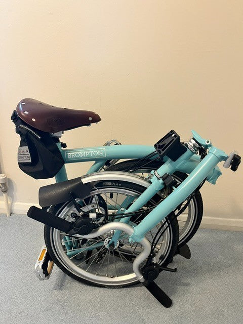 brompton folding bicycle, used twice then stored, immaculate condition.