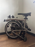 BRAND NEW Brompton T-Line Folding Bike with Quad Lock phone holder and lights