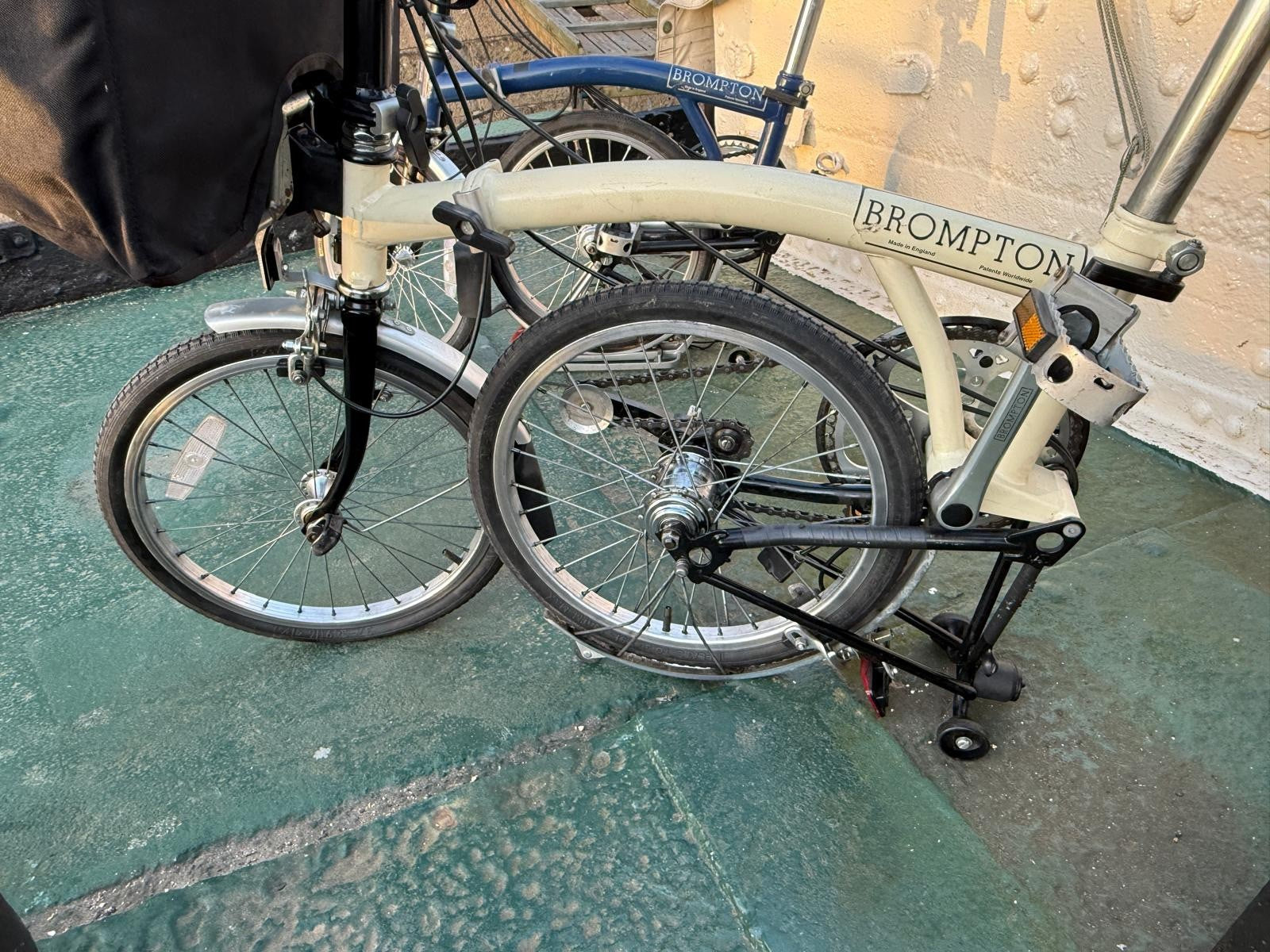 2 Bromptons. 1 x   Navy 6 Speed DYNAMO Light 1 x cream 5 speed.