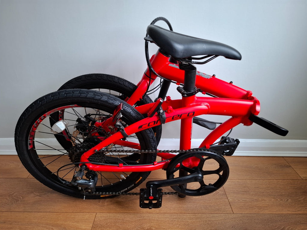 Carrera Intercity Disc 8-Speed Folding Bike With Accessories and more
