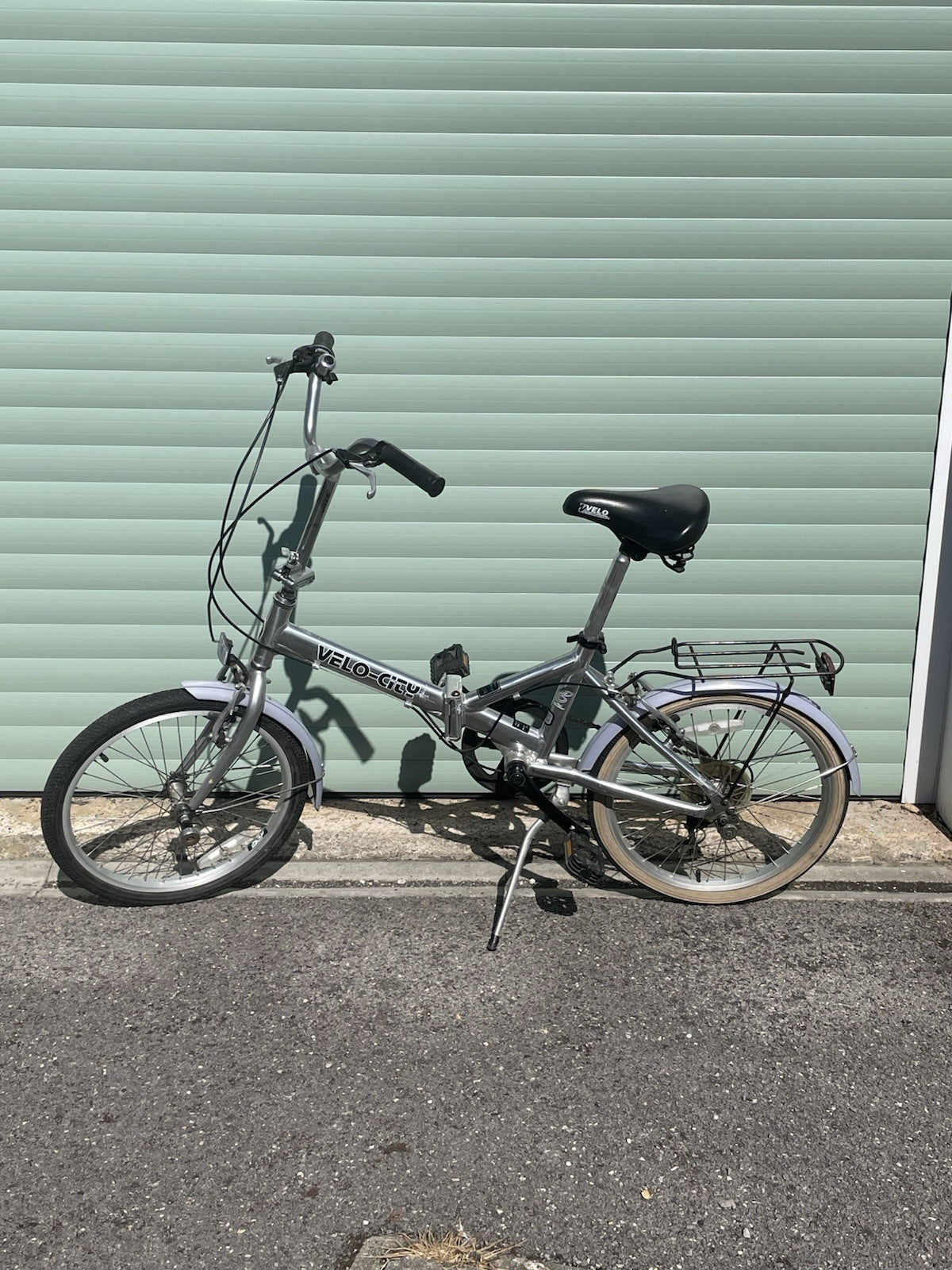 A Pair Of Velo-city 5 Speed Folding Bikes In Good Condition With Bags