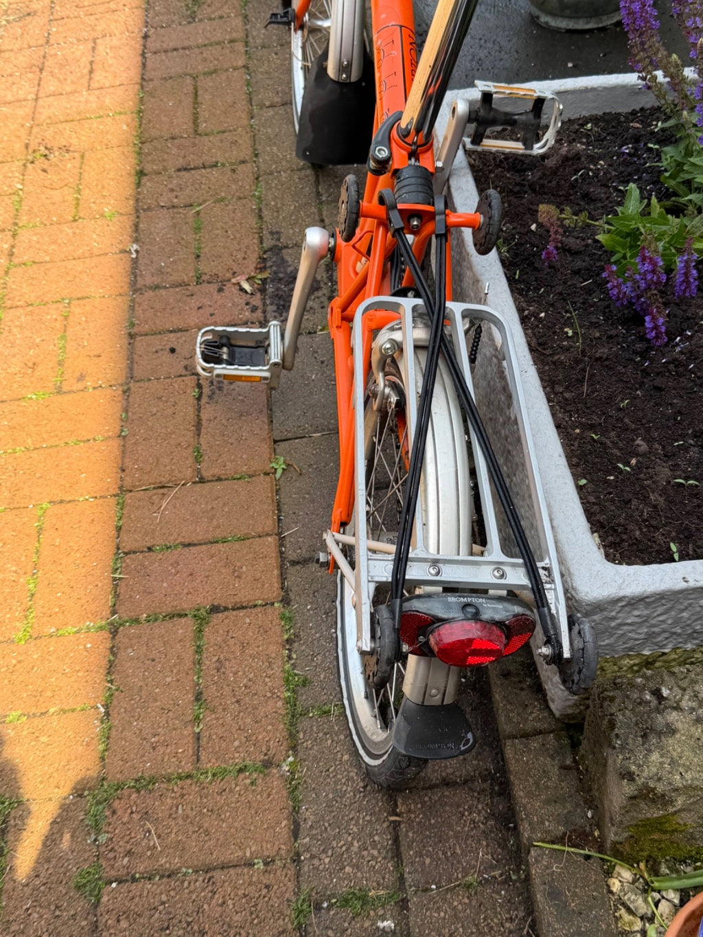 brompton folding bike 6 speed Orange .Item in good working order.