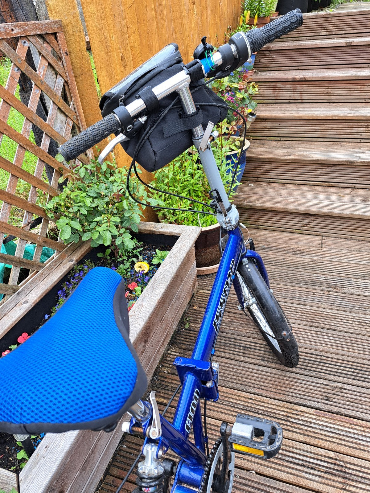 folding bike, blue 5 speed with parcel rack, 29" wheels, good condition.