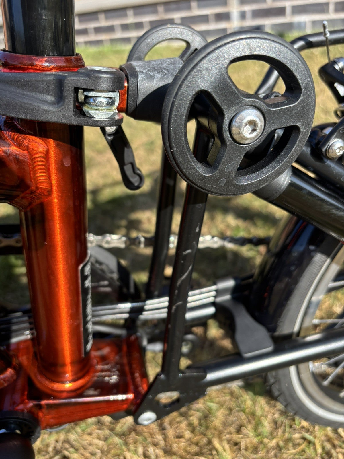 Brompton Electric C Line Explore Mid + Rack - 12 Spd - flame lacquer