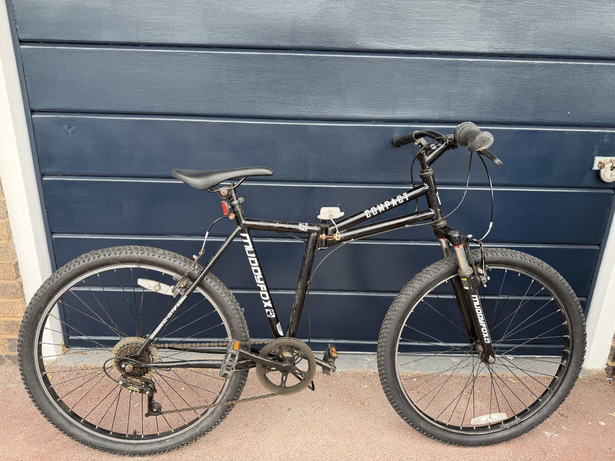 Muddy Fox Compact folding mountain bike with 19 inch frame and 26 inch wheels