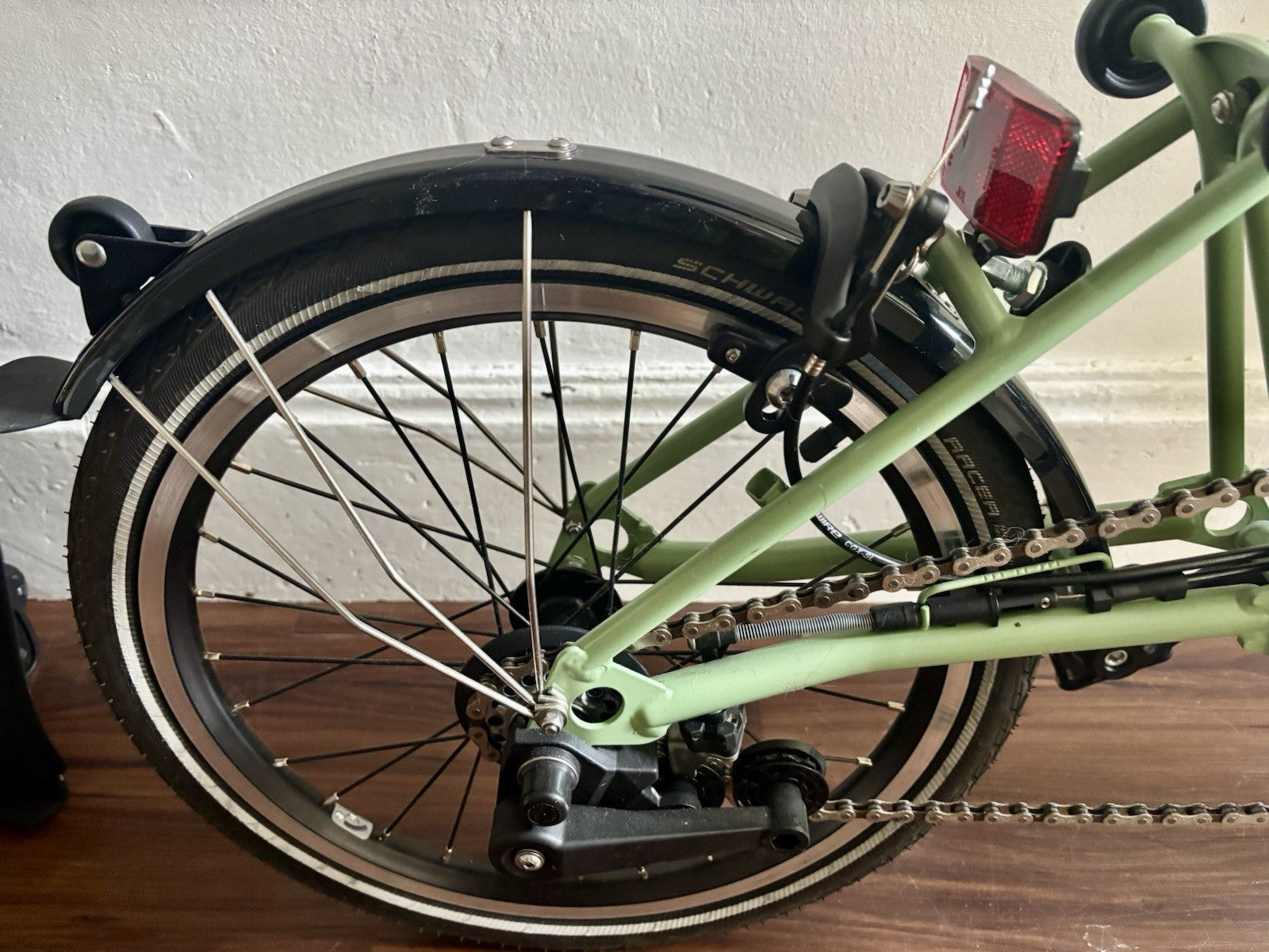 Brompton C Line 2 Speed Matcha Green 2023 with brompton bag and pump