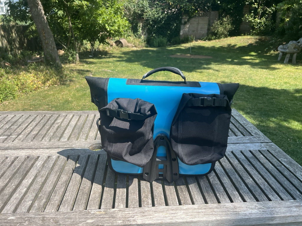 Brompton S2L Folding Bike black plus Brompton/Ortlieb blue front bag