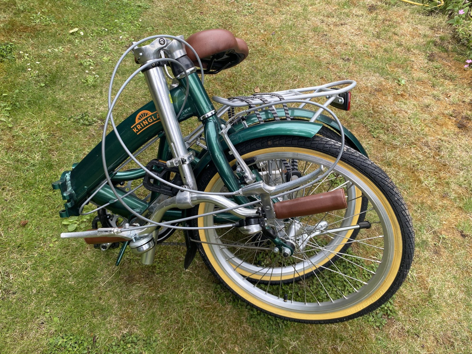 Green and Brown Kringla folding bike. Great Condition. Barely used.