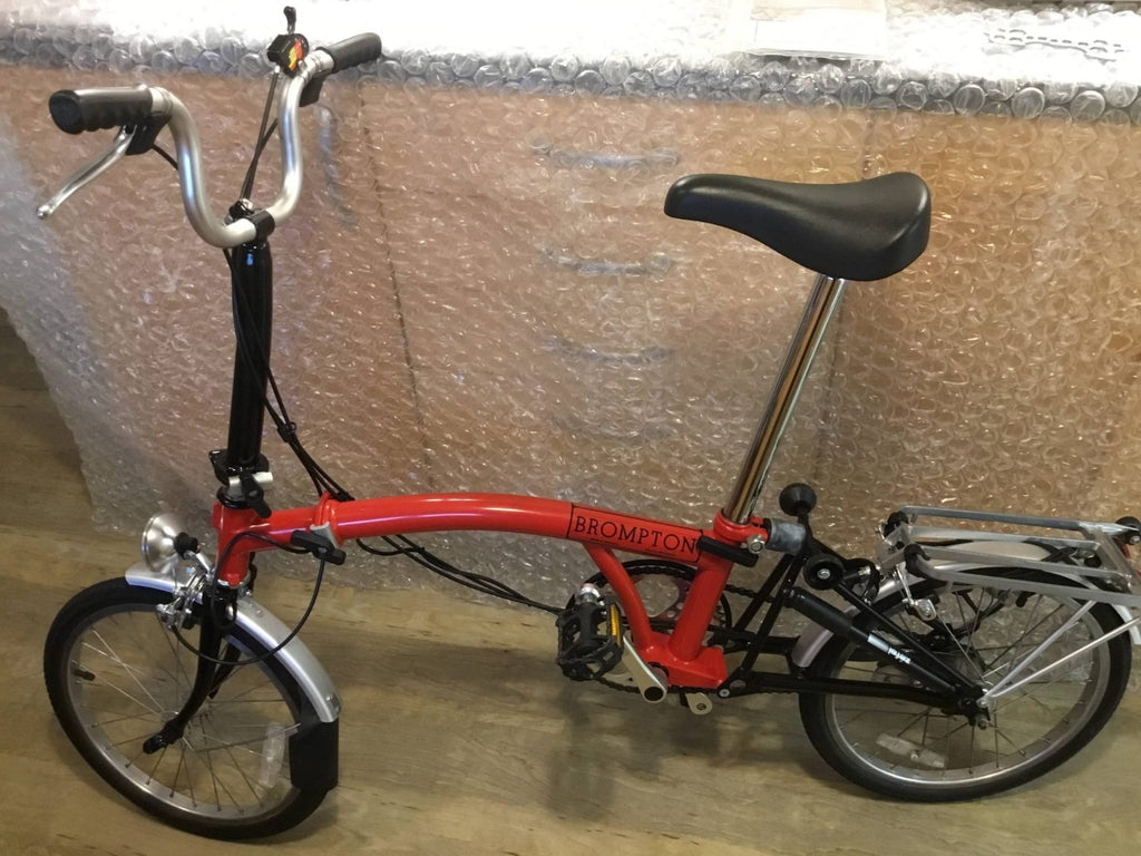 Brompton Folding Bike Red with Reflectors and Mudguards.