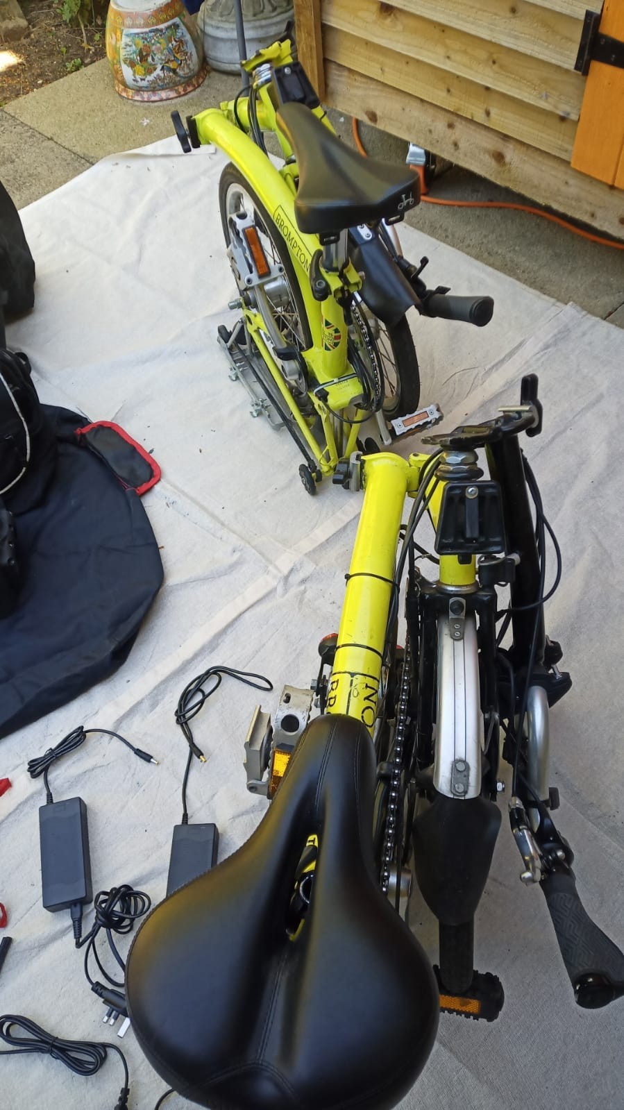 A Pair Of Canary Yellow Bromton Bikes