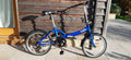 Apollo Tuck folding bike with storage bag
