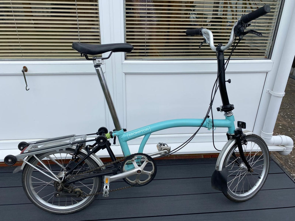 Brompton M3L.  Turkish Green and Black.  With Rear Luggage Rack