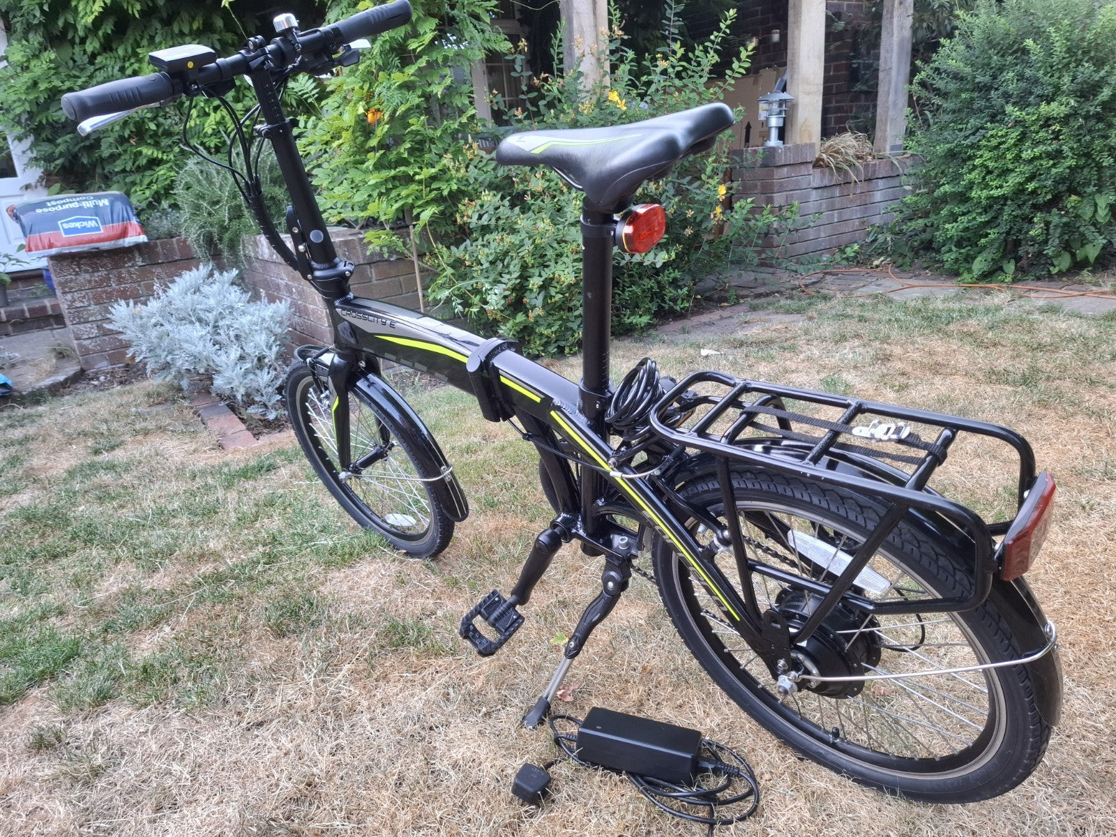 Halfords Crosscity -E Folding Bike, unused condition