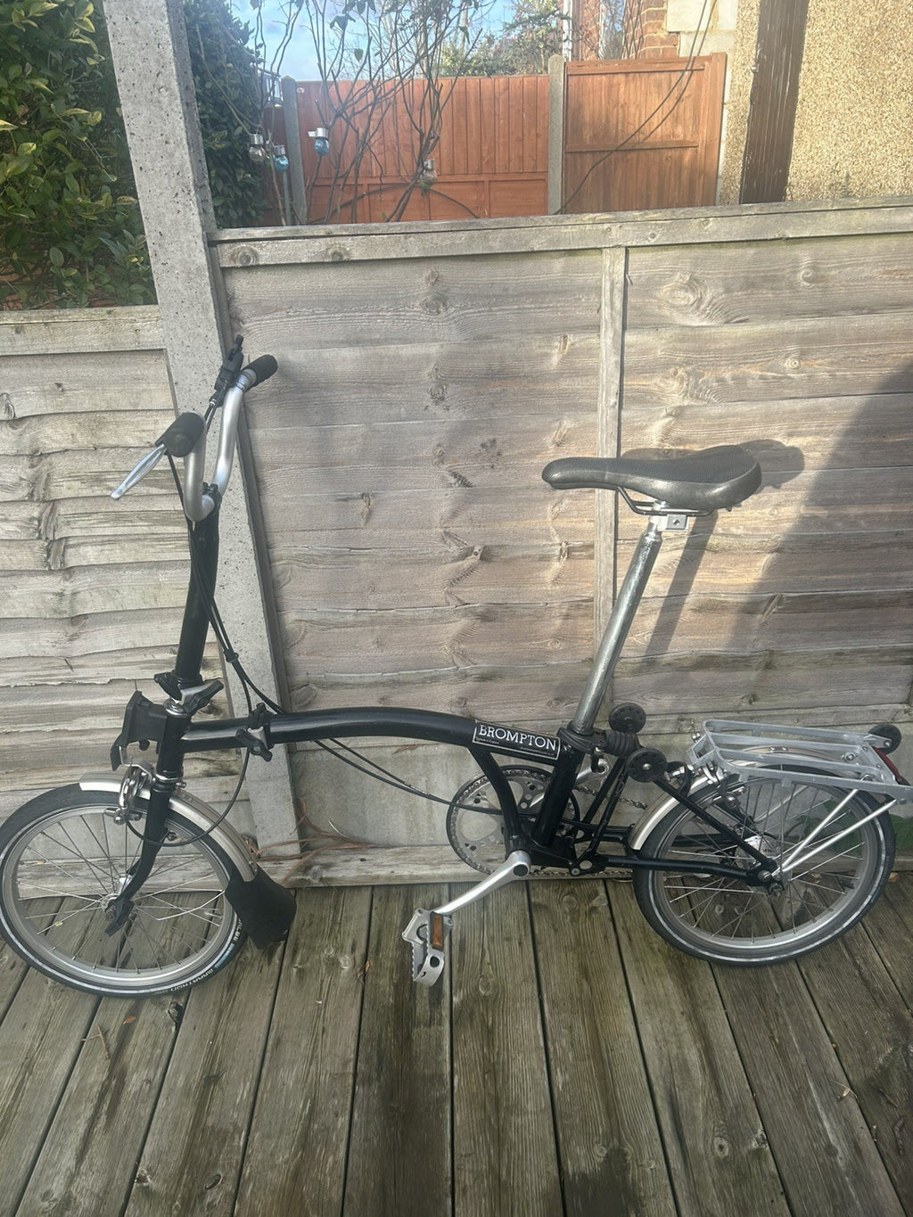 Brompton H3L Black with a rack