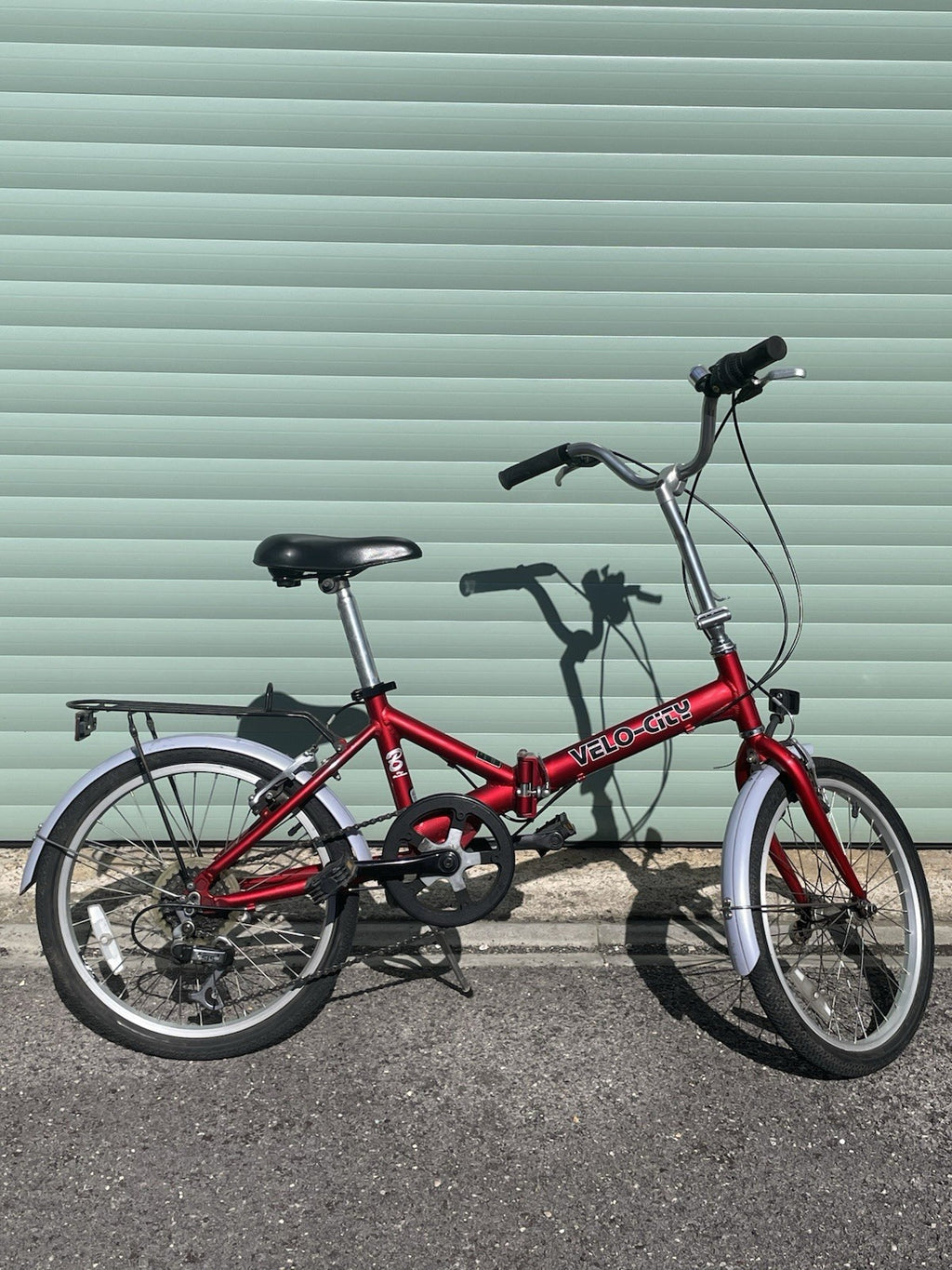A Pair Of Velo-city 5 Speed Folding Bikes In Good Condition With Bags