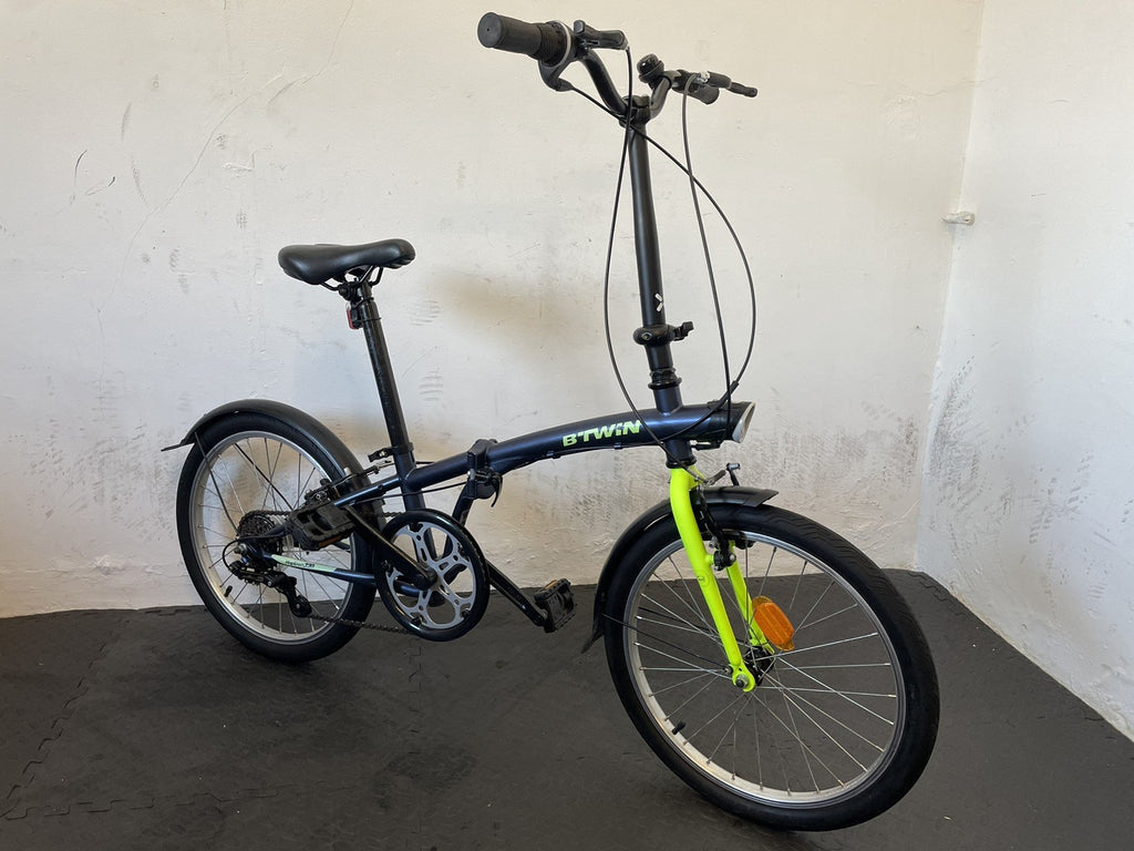 B Twin Tilt 120 Folding Bike 20 Inch Wheels. 6 Speed Matt Navy And Neon.