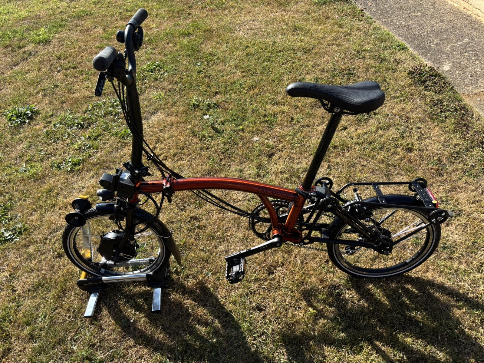 Brompton Electric C Line Explore Mid + Rack - 12 Spd - flame lacquer
