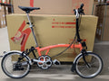Brompton C-Line Explore Mid bar Folding Bike Fire Coral