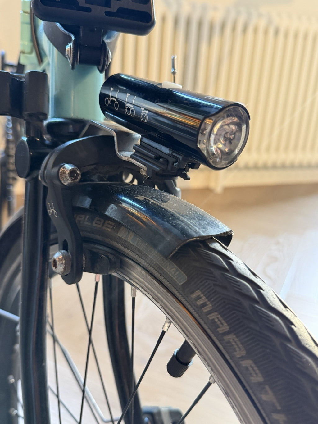 Brompton M6L Superlight — Turkish Green/Black Edition with battery lighting