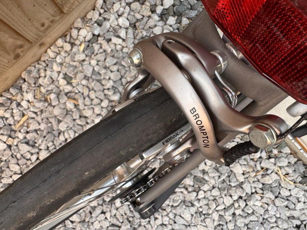 Brompton Titanium / Steel Single Speed 8.3kg with ancillaries