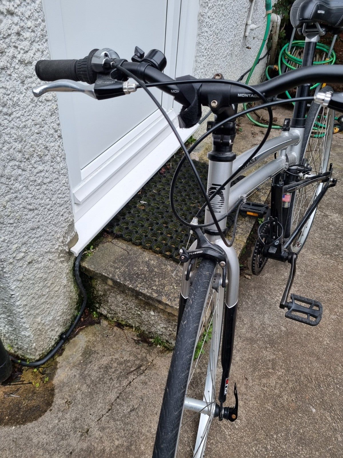 Montague Urban folding bicycle with full size wheels. Silver excellent condition