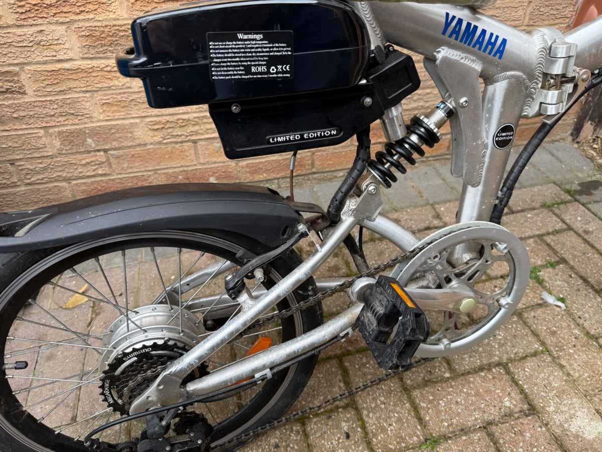 Two used foldable, pedal bikes with Shimano gears and front/back suspension