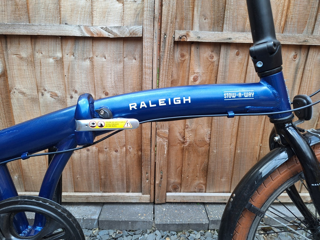Raleigh Stowaway Folding Bike Blue, Shimano 7-Speed Unisex