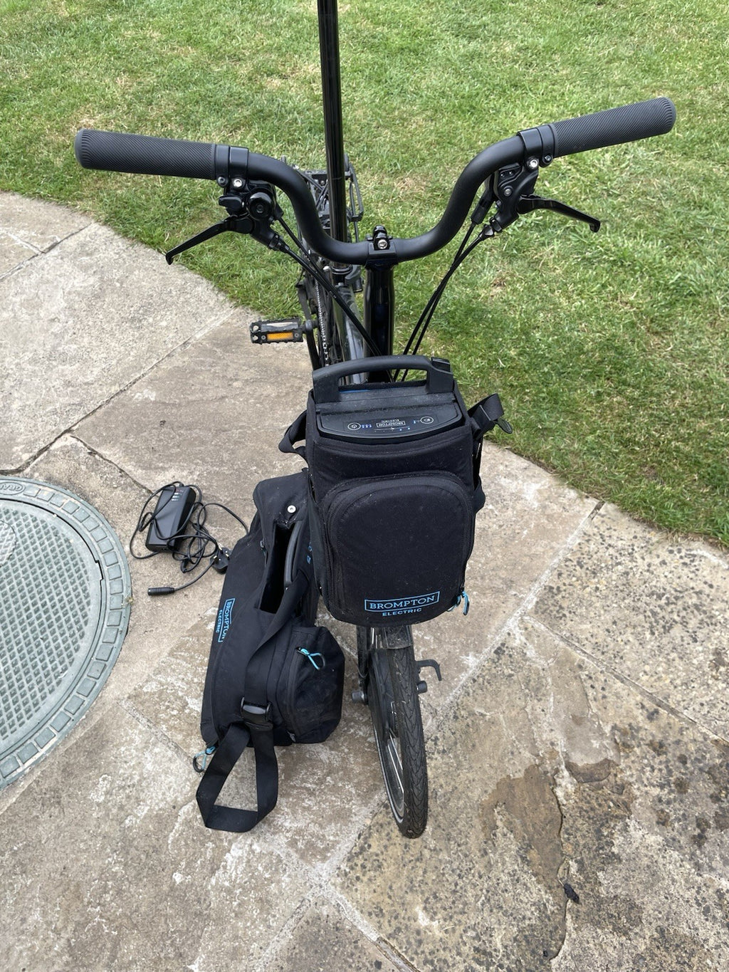 Brompton E-Folding Bike 6-Speed with Rear Rack And Large City Bag