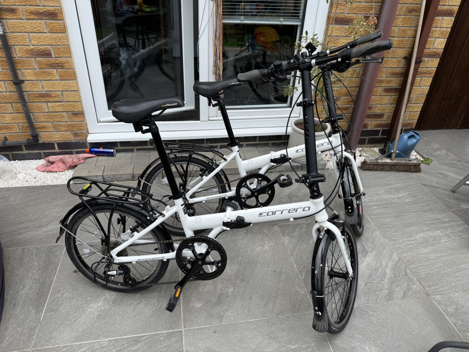 Pair of Carrera Transport not transit Folding Bikes aluminium frames
