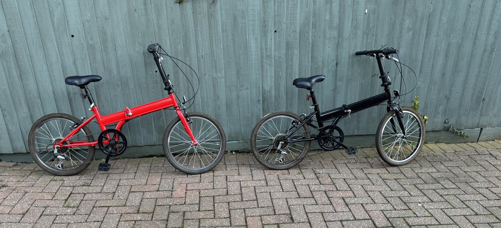 2 Folding Bikes, 1 Red and 1 Black, price is for both, 5 gears.