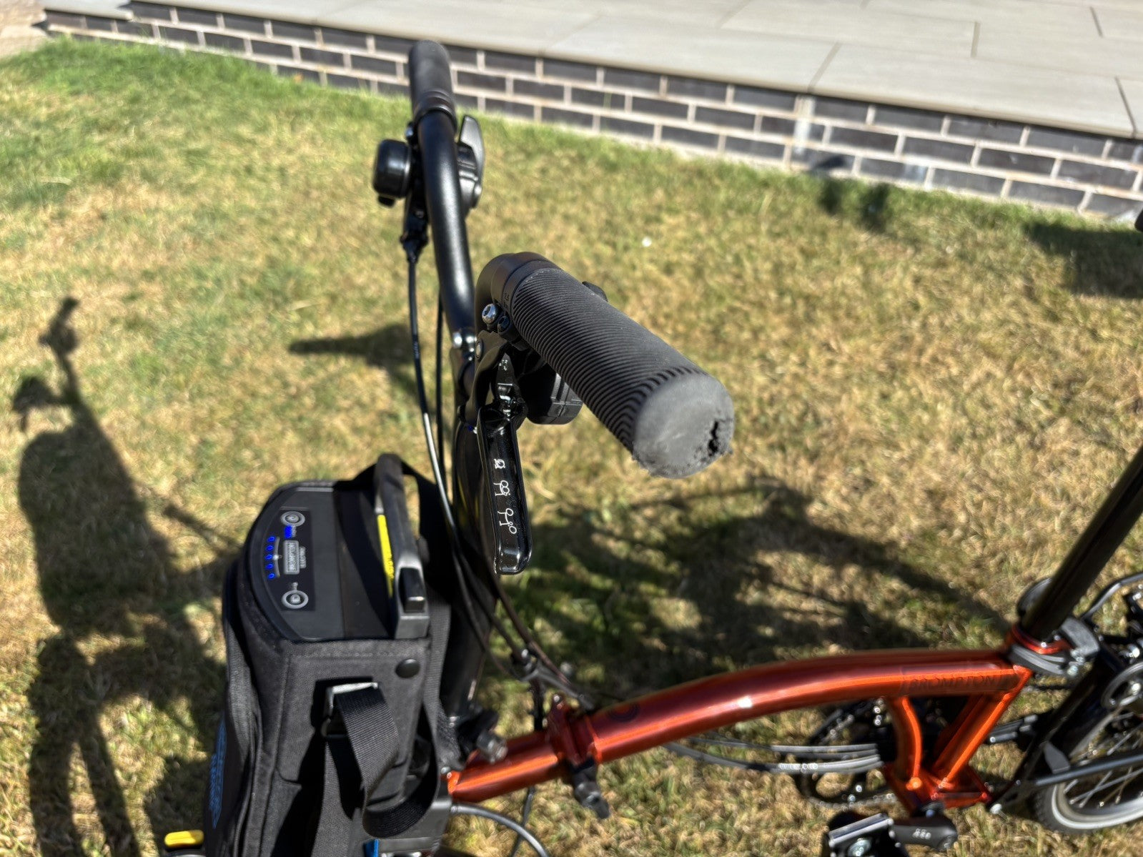 Brompton Electric C Line Explore Mid + Rack - 12 Spd - flame lacquer