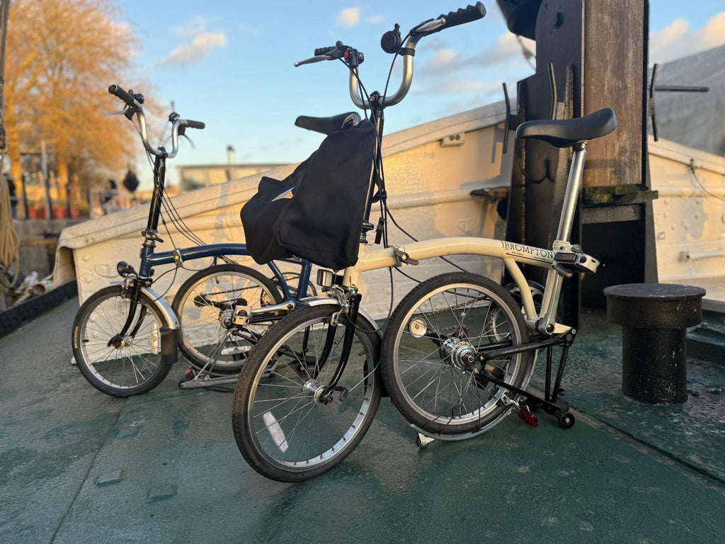 2 Bromptons. 1 x   Navy 6 Speed DYNAMO Light 1 x cream 5 speed.