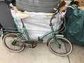 The Vintage Retro 1970s Hercules Compact folding bike in blue