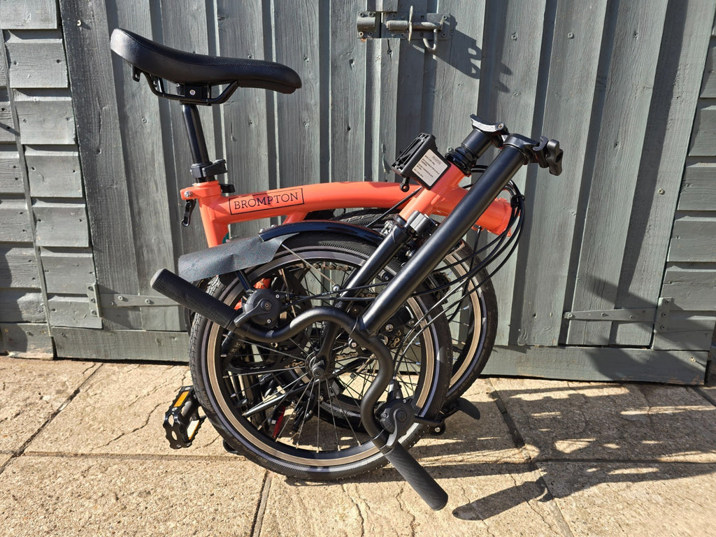 Brompton folding bike, 6 speed, C Line, registered Sept 23, orange