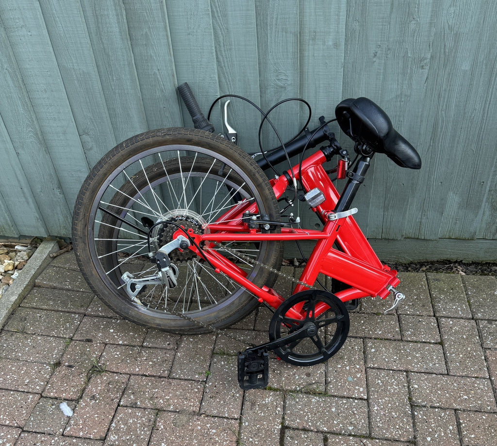 2 Folding Bikes, 1 Red and 1 Black, price is for both, 5 gears.