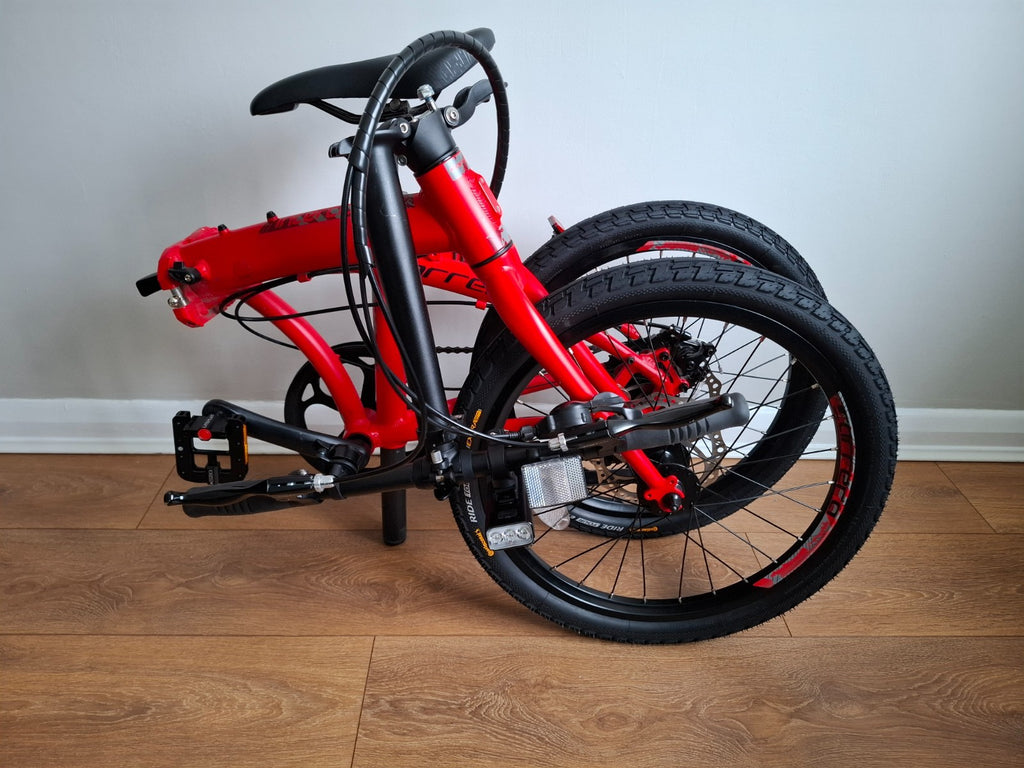 Carrera Intercity Disc 8-Speed Folding Bike With Accessories and more