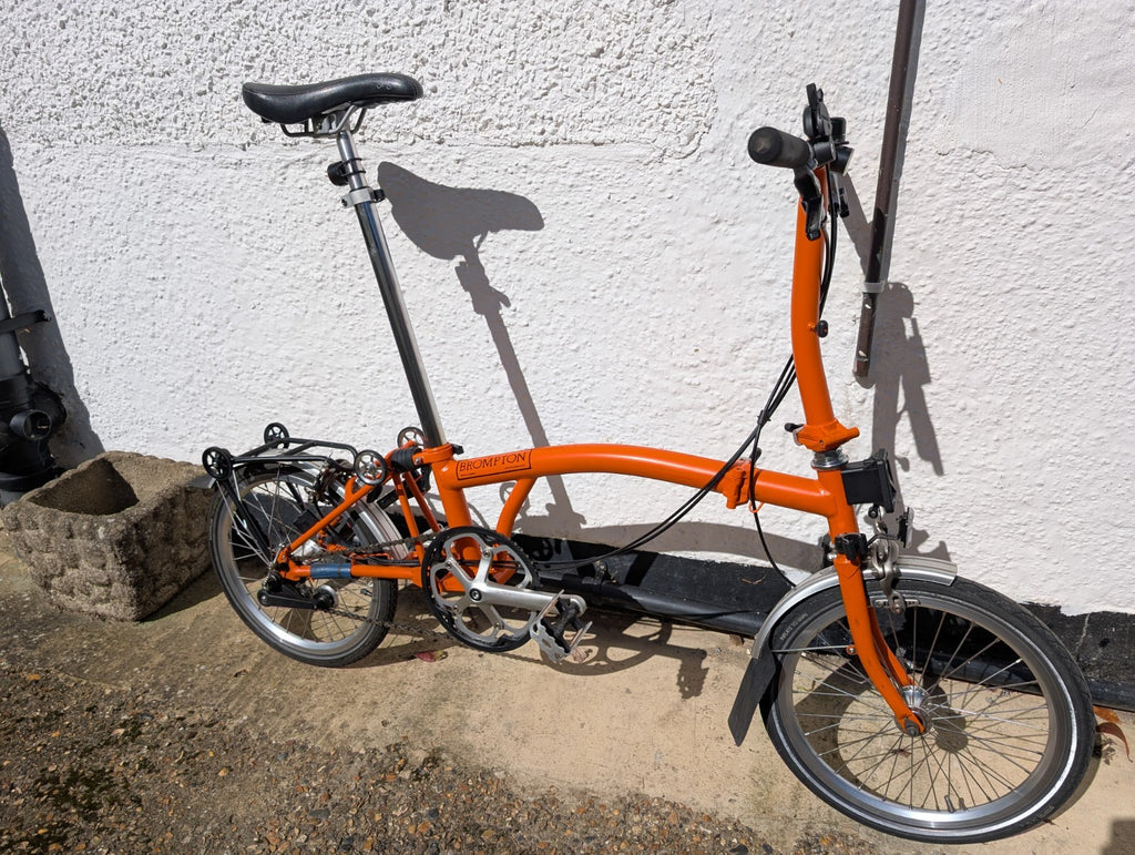 Brompton S3L folding bike 3 speed orange + bag + extended seat post.