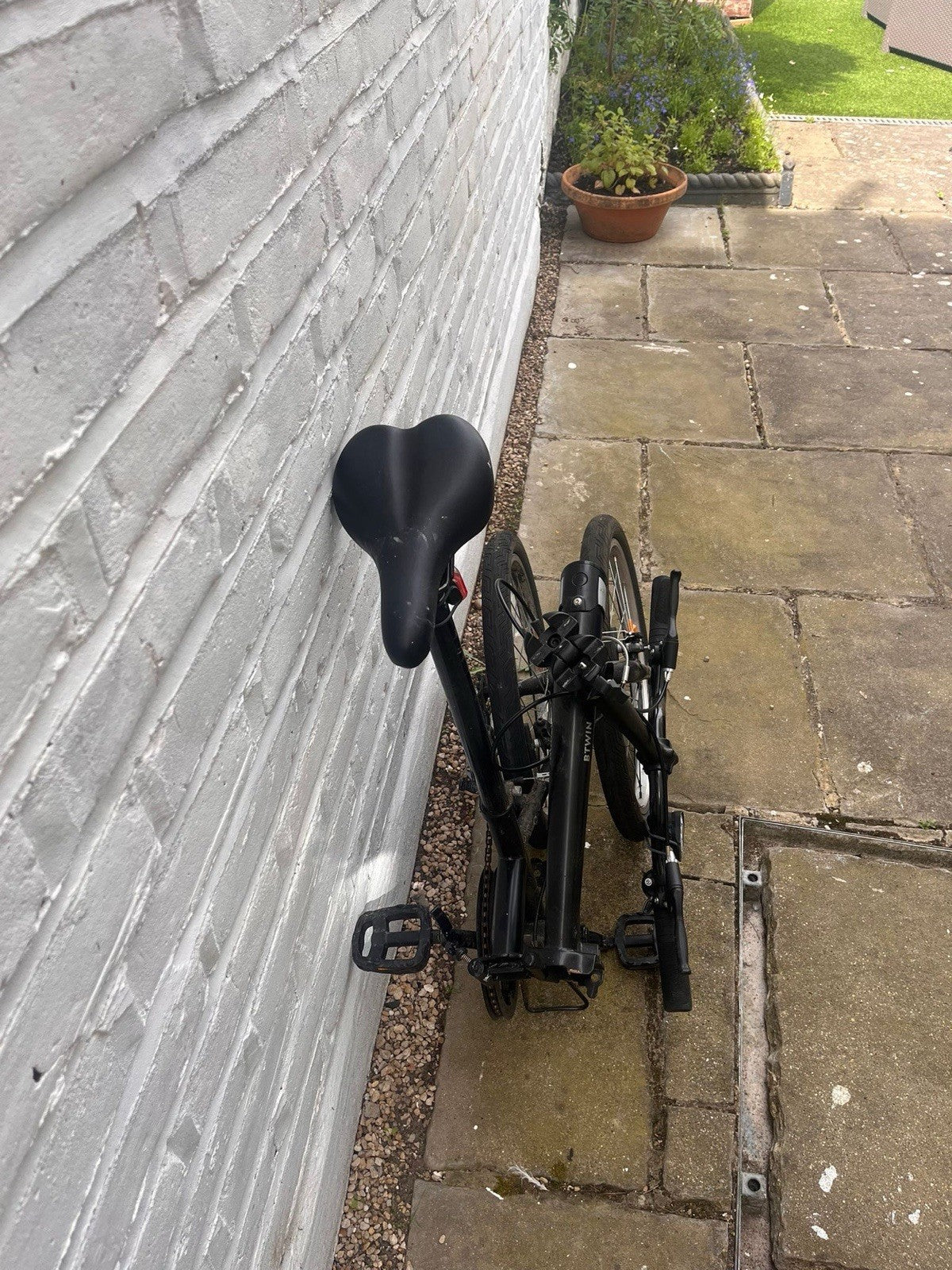 Black BTWIN folding bike