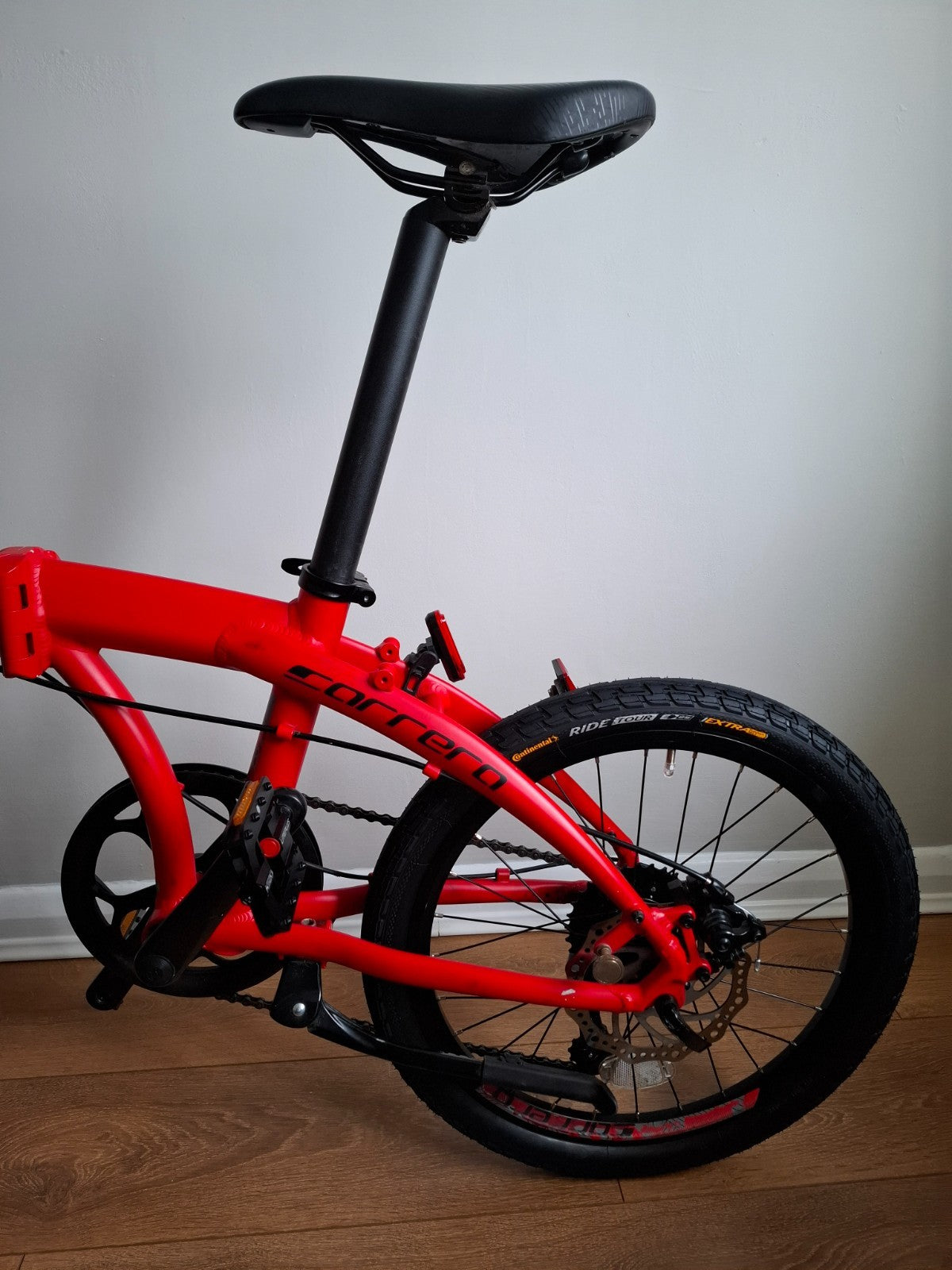 Carrera Intercity Disc 8-Speed Folding Bike With Accessories and more
