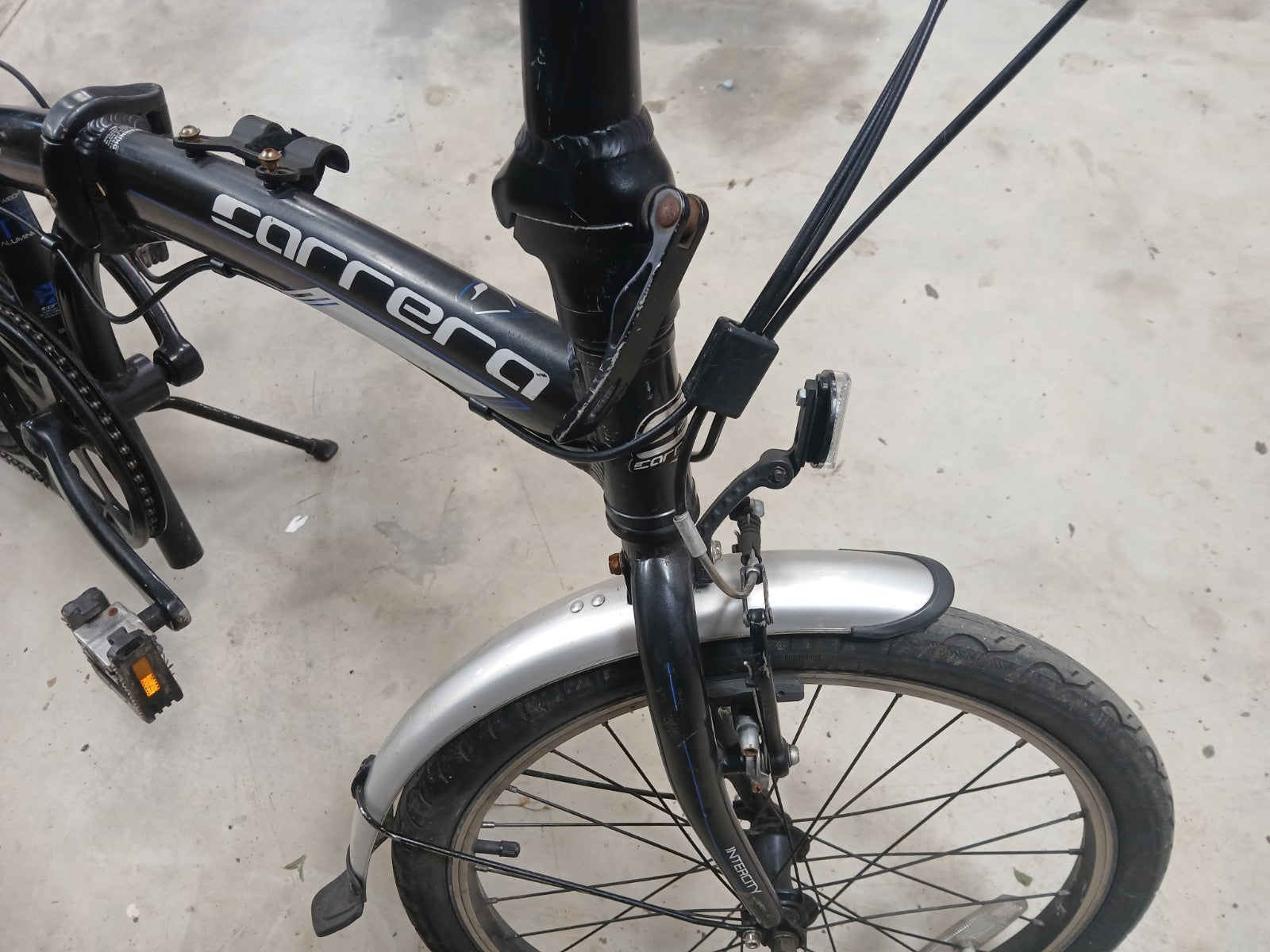 Carrera Intercity 20in Folding Bike Aluminium 8-Speed Grip Shifter Black/Blue