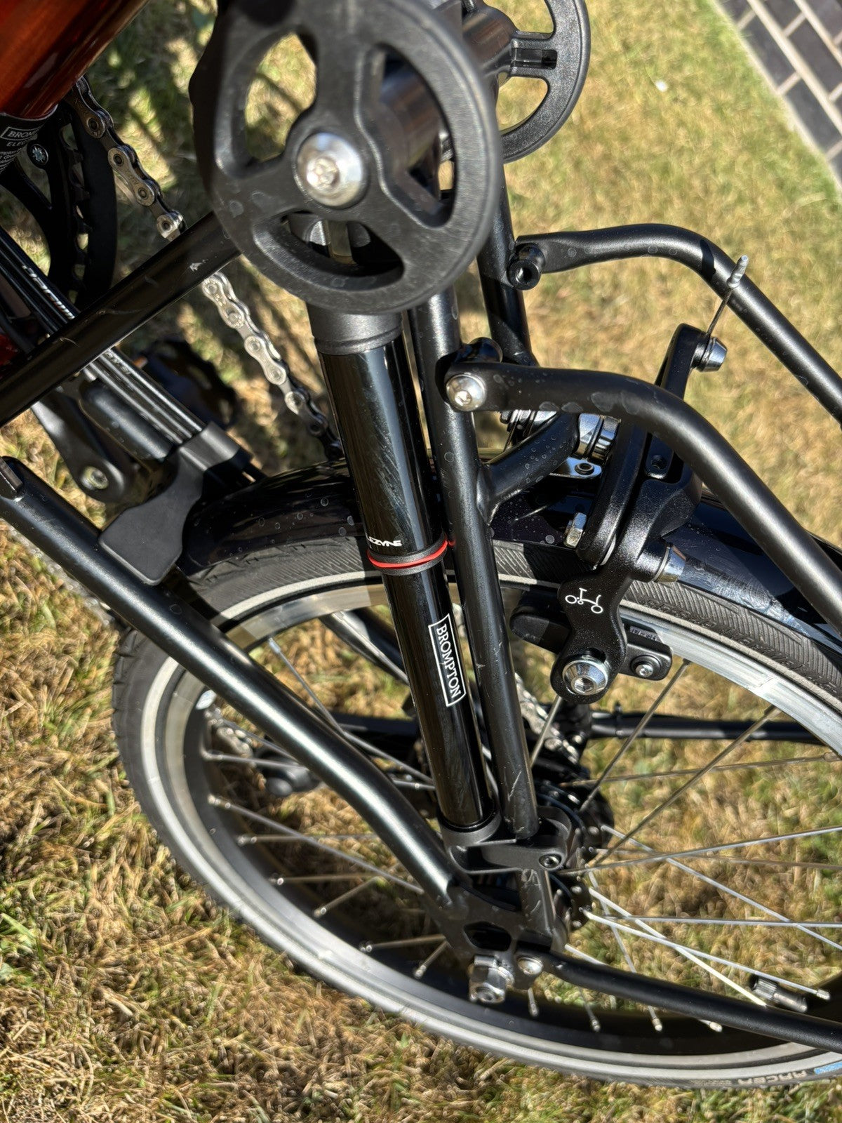 Brompton Electric C Line Explore Mid + Rack - 12 Spd - flame lacquer