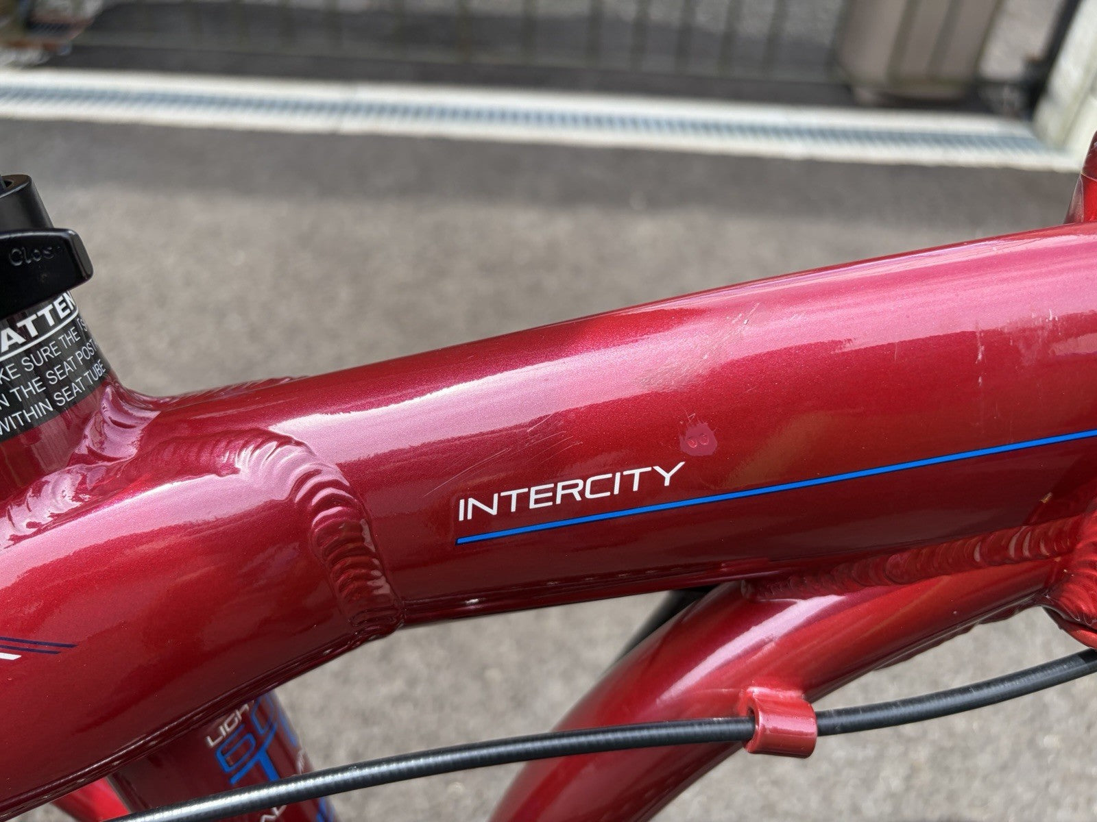 Carerra Intercity Folding Bike In Red.