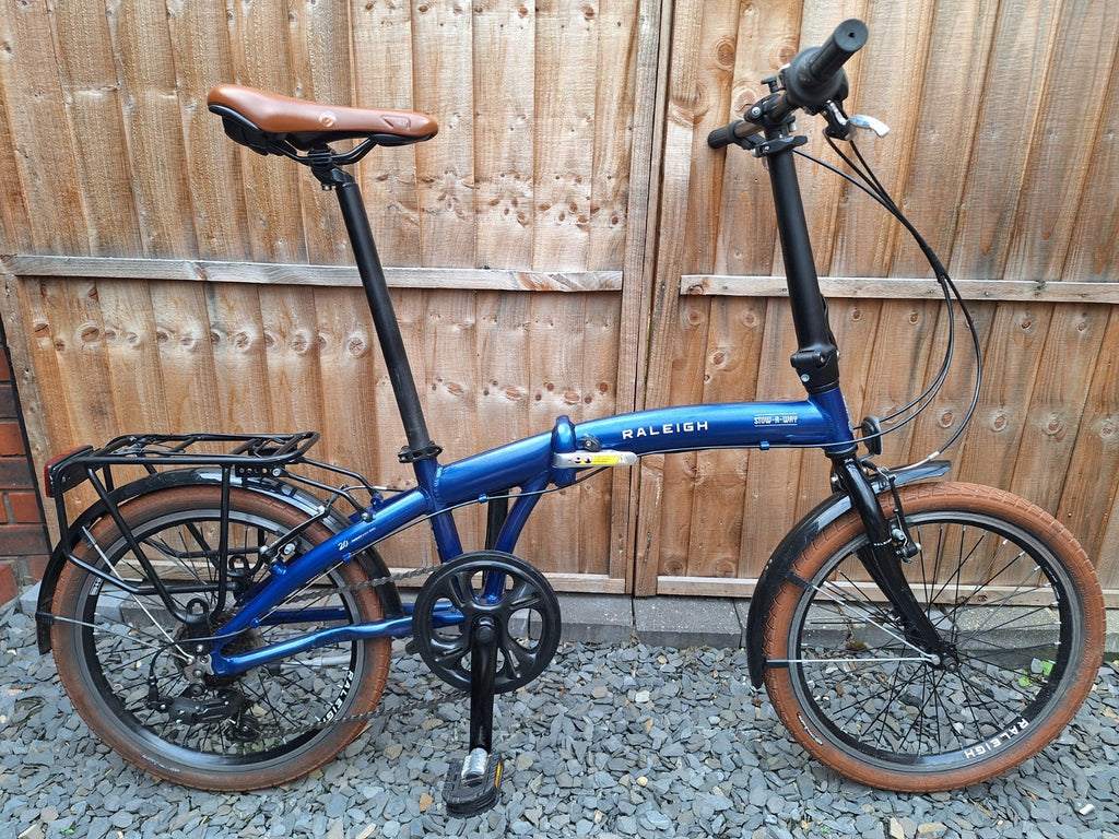 Raleigh Stowaway Folding Bike Blue, Shimano 7-Speed Unisex