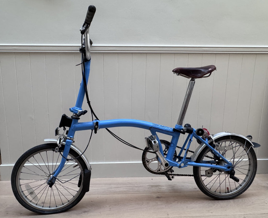 Brompton 3 speed folding bike, Brooks saddle, Ortlieb rack bag